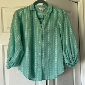 Lauren Conrad cute turquoise blouse with white flowers.